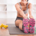 Woman Stretches in Athletic Gear